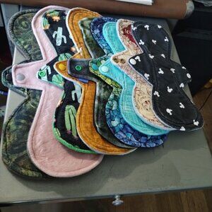 Reusable pads Never Used -9 items Differant lengths--200